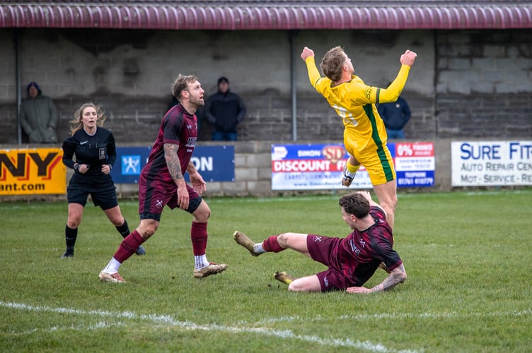 Action from Paulton Rovers' 7-1 home win over Street on Boxing Day