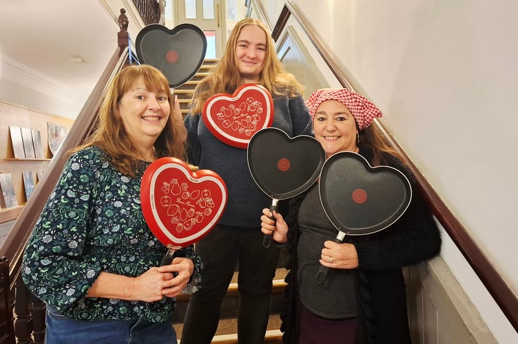 Frome Town Council staff Tracy, Becca and Nykki get ready to flip some pancakes