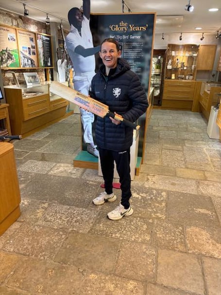 Erin Osborne called into the Somerset Cricket Museum to catch up on the club's history and she is seen with a cricket bat belonging to Viv Richards