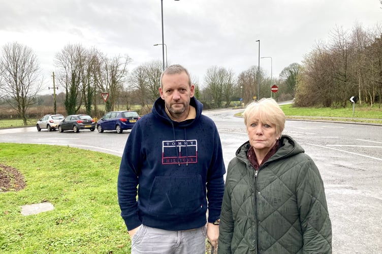 Cllr Gavin Heathcote (left) and Cllr Karen Walker (right) at A367/Bath Road junction where B&NES has pulled the plug on plans to build a new roundabout.