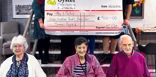 Care home donates £1,000 to charity