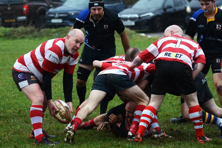 Midsomer North (red and white hoops) set up another attack