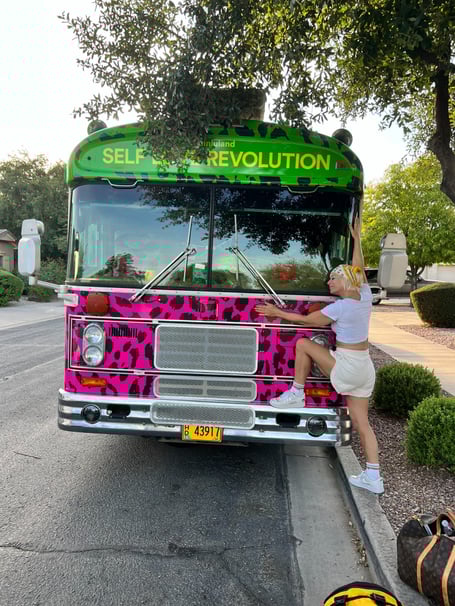 Lou Featherstone, motivational speaker and performer will be bringing her Self Love Revolution tour bus to Frome. 