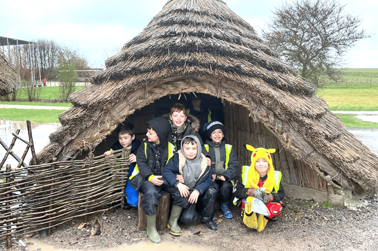 The pupils spent time exploring the Neolithic dwellings at the English Heritage curated attraction. 