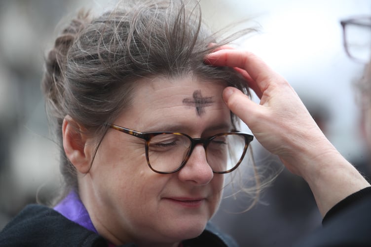 Ash from the previous year's Palm Sunday is usually used to present the sign of the cross.