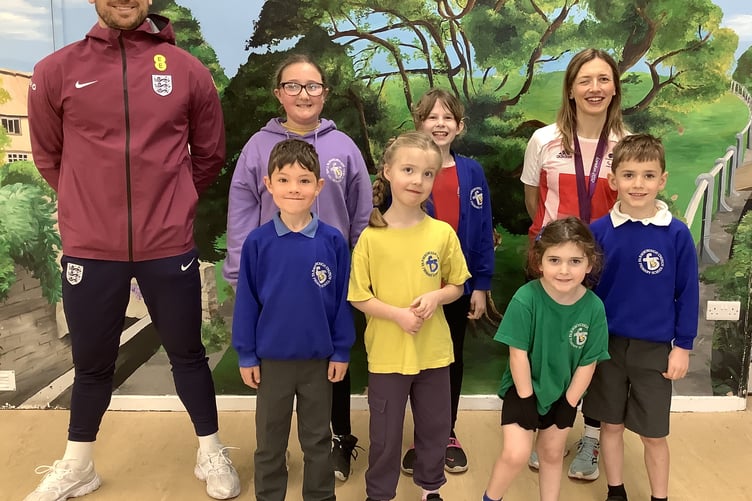 Paralympians Jack Rutter and Katrina Hart put Farmborough Church Primary pupils through their paces.