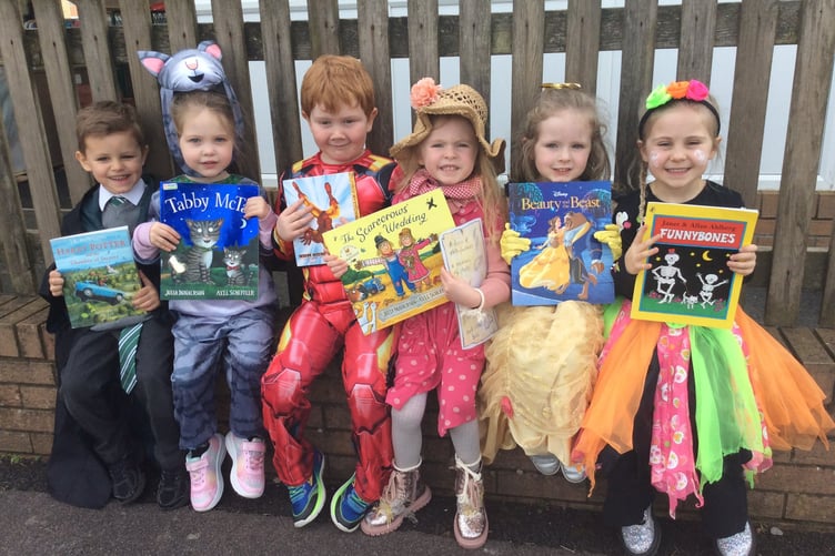 Younger pupils at St Benedicts in colourful costumes with their favourite book from home.