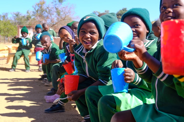 On July 8, 2025, a collaborative effort between Amazwamabili Primary School volunteers and Mary's Meals International facilitated the provision of nutritious porridge to school children in Nkayi, Zimbabwe. This initiative is part of the organization's comprehensive school feeding program, which has achieved a notable milestone of providing sustenance to over three million children in sixteen countries every scool day, thereby reinforcing its dedication to improving global nutrition and educational outcomes.