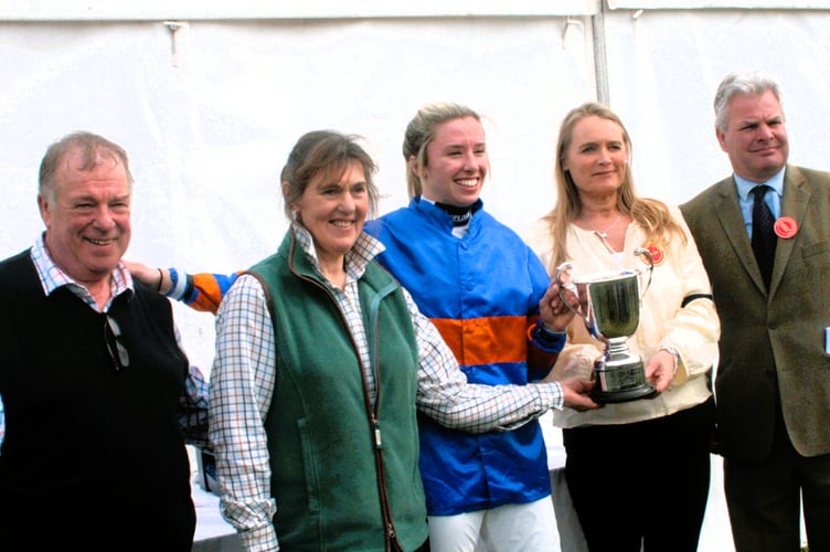 Owners Martin and Jane Wanless, with their jockey, receiving the trophy for the Killens Ladies Open Race from Sally and Tom Killen 