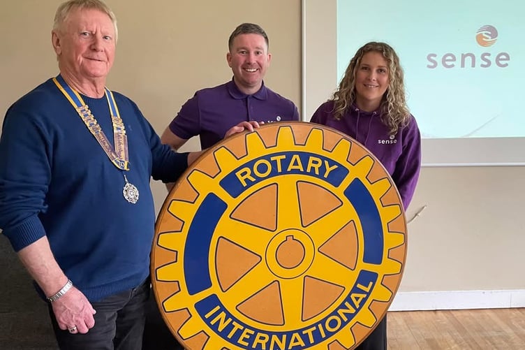 President of Midsomer Norton and Radstock Rotary Club John Dando welcomed Owain and Danielle from SENSE.