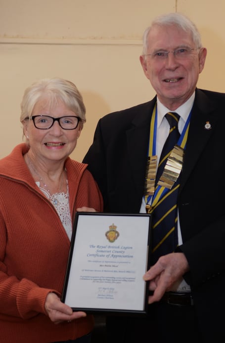 Volunteer Pattie Nicol celebrates 25 years unbroken service raising funds for the RBL poppy appeal. 
