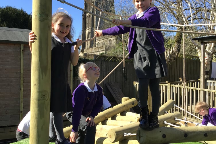 Pupils at Leigh on Mendip School couldn't wait to get on the new timber play trail with their friends.