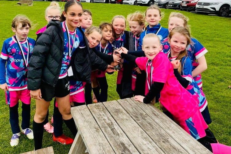 Timsbury Athletic Girls' celebrate their success