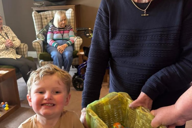 'Little Gran', resident Rose handed out Easter eggs to children from Rockers and Rollers Day Nursery, including her great-grandson.