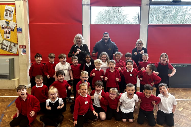  Pupils from Rabbit class channeling their inner gladiator with strong man Zack George. 