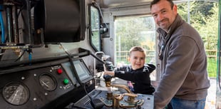 Radstock schoolboy's names new electric locomotive at Whatley Quarry