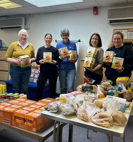 Radstock Food Club volunteers at Easter with the chocolate eggs they provided for each family.