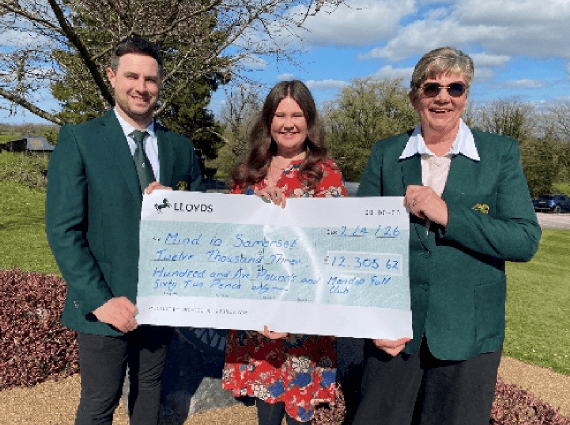 Jack Hayes, Louise Scott and Victoria from Mind in Somerset being presented with a cheque for £12,306.