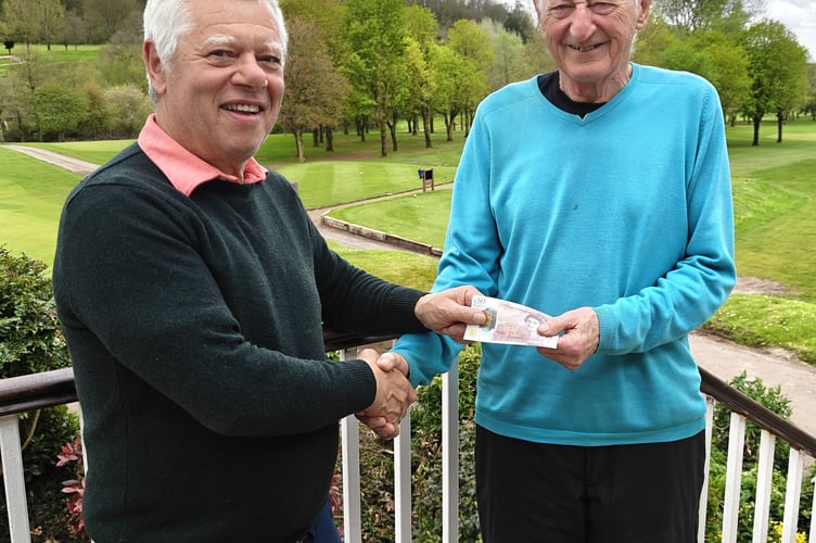 Mel Field (Wells GC Seniors' captain) on the left and Chris Strickland with the hole in one cash prize.