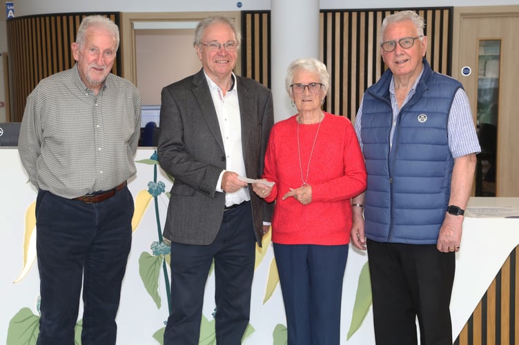 A successful community fundraising evening in Camerton has raised £2000 in support of cancer services at the Royal United Hospital, Bath.