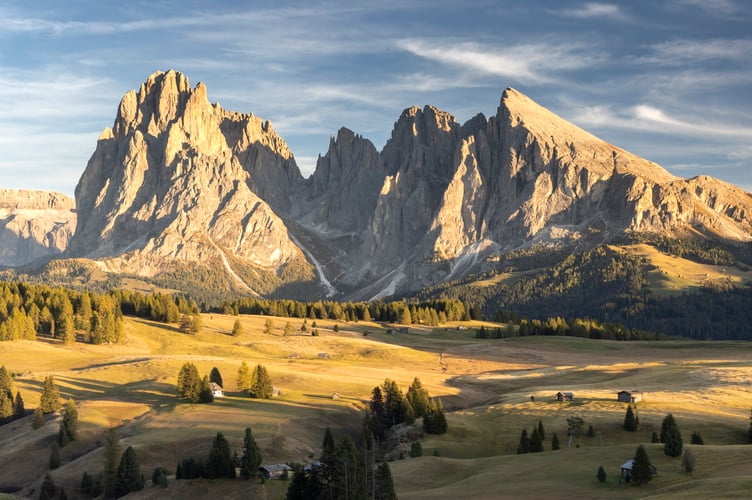 The largest high altitude alpine meadow in Europe, the Alpe di Siusi in the Dolomites, in October. 