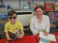 Volunteers improve pupils reading skills through support in schools