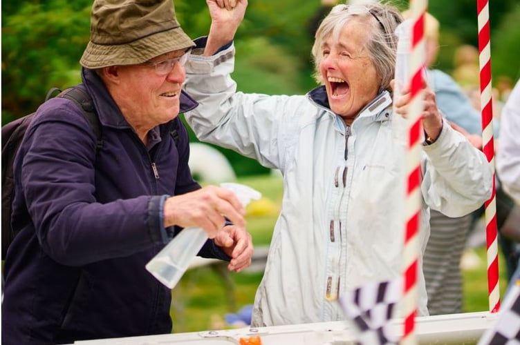 Winner! This couple became quite competitive when they took on the Blagdon Rainbows' Duck Buzzer Challenge and Duck Race