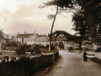 Mystery Photo: A man and his child at a crossroads but which? 