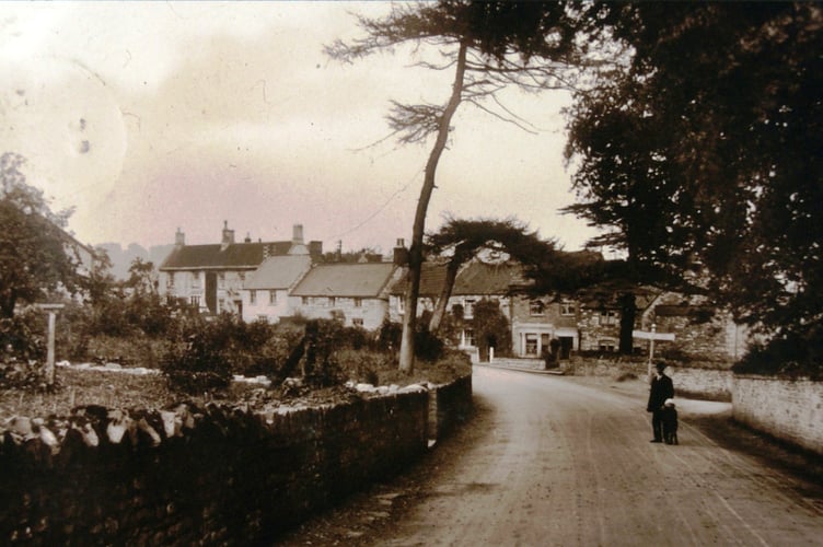 This man and his child are stood near a crossroads but do you recognise the road?