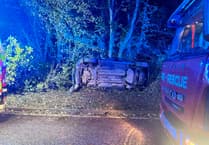 Firefighters called as car leaves road and overturns in field near Frome
