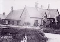 Mystery photograph: Do you know where these three little girls are stood?