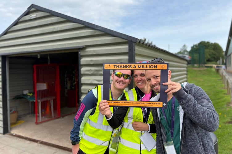 Cheddar volunteers celebrating one million parkruns across the globe involving 9 million people.