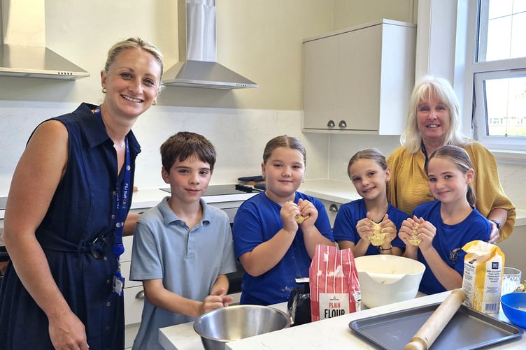 Yr 4 pupils trying out the Cookery Corner at Peasedown St John Primary School after its makeover.