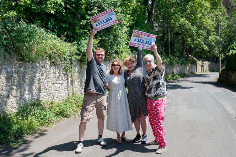 Neighbours from Frome each won £333,333 in the Postcode Lottery this July.