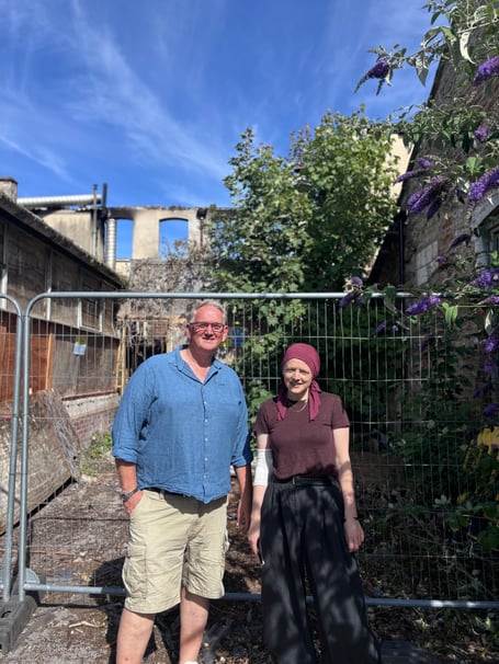 Frome Town Council leader Cllr Fiona Barrows visits the site of the Saxonvale fire with Cllr Steve Tanner.