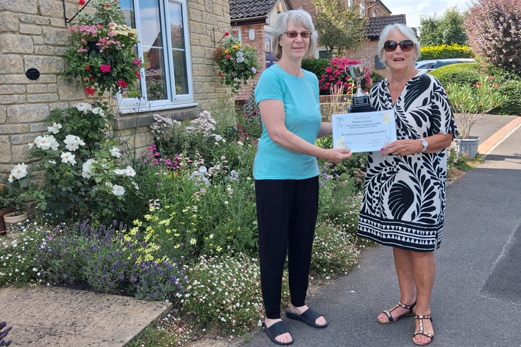 Mr and Mrs Jennings of Nightingale Way won best front garden with its stunning display of vibrant blooms.