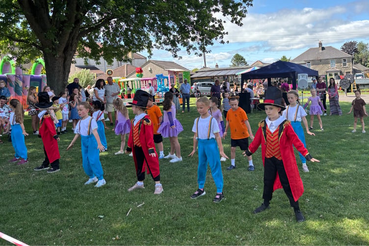 Intense concentration as a group of youngsters take to the arena at the Paulton Party in the Park.