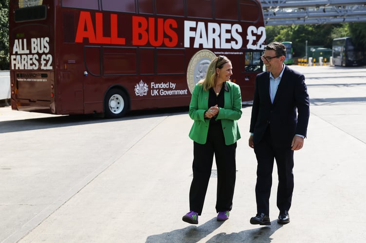 PM Andy Burnham visits First Bus's Bath depot as new bus fare cap announced for January 2027.