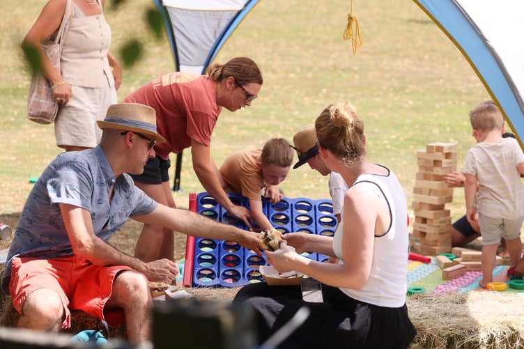 Even the youngest members of the community were kept busy at the summer party.