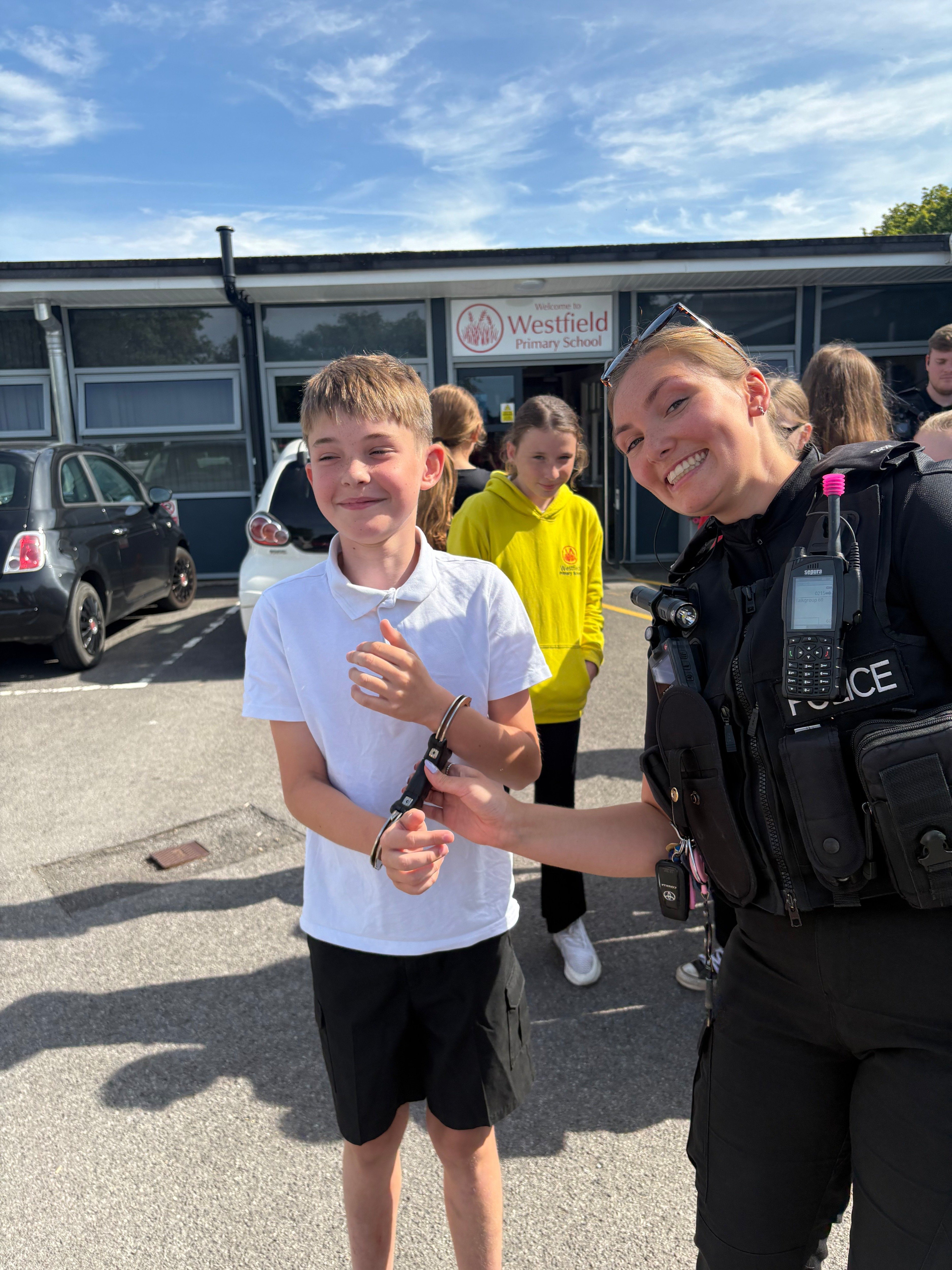 Avon and Somerset Police had the pupils in handcuffs... but only during an interactive session on police work.