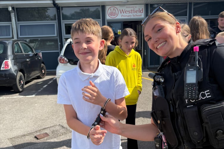 Avon and Somerset Police had the pupils in handcuffs... but only during an interactive session on police work.