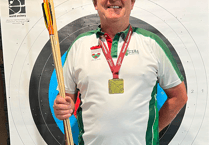 Richard becomes national archery champion