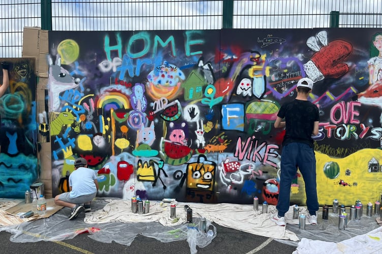 A graffiti workshop helped to channel the creative juices of Frome's young people during Refugee Week in 2024.