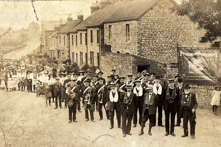 Can you guess the location and extra points if you can guess who is leading the procession. 