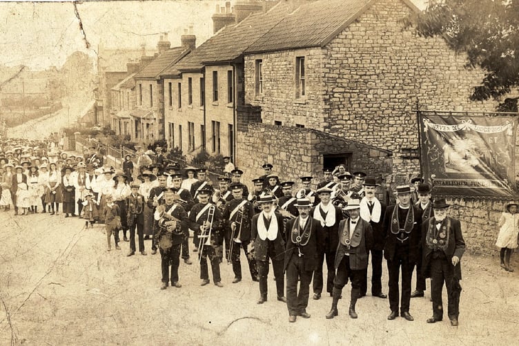 Can you guess the location and extra points if you can guess who is leading the procession.