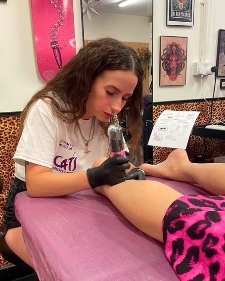 A Tats for Cats flash event at Radstock's Iris Ink raised more than £500 for Cats Protection in the local area.