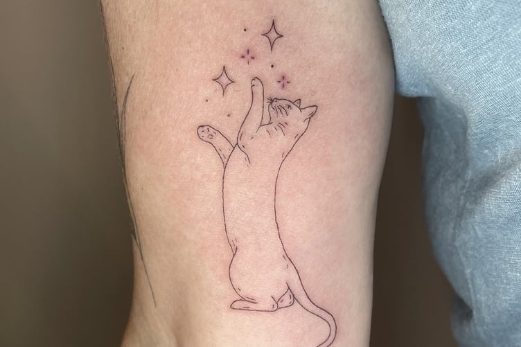 One of the cat-themed tattoos on offer during the Tats for Cats event.