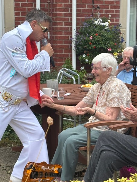 Elvis tribute act,  Andy Treble, thrilling residents at Saltford Kingfisher Lodge care home.