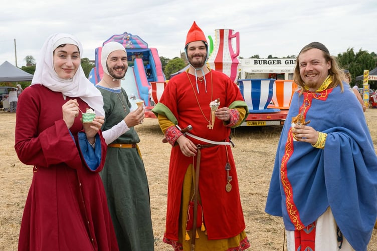 Historia Normannis taking a well-deserved break from battle reenactments with ice creams all round.