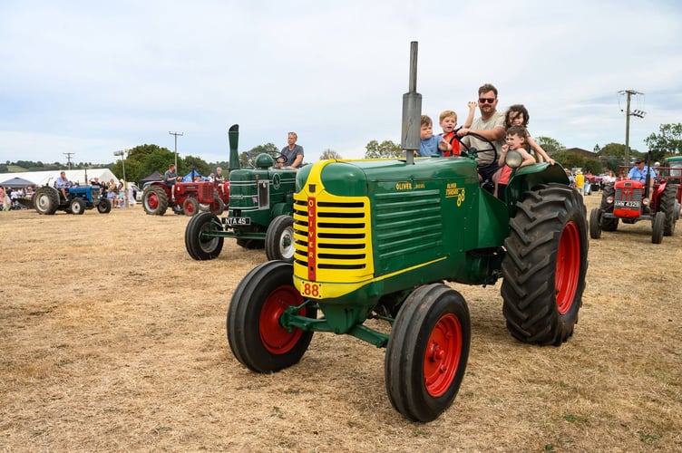 A parade of the winners in the classic vehicle competition took to the main display arena.